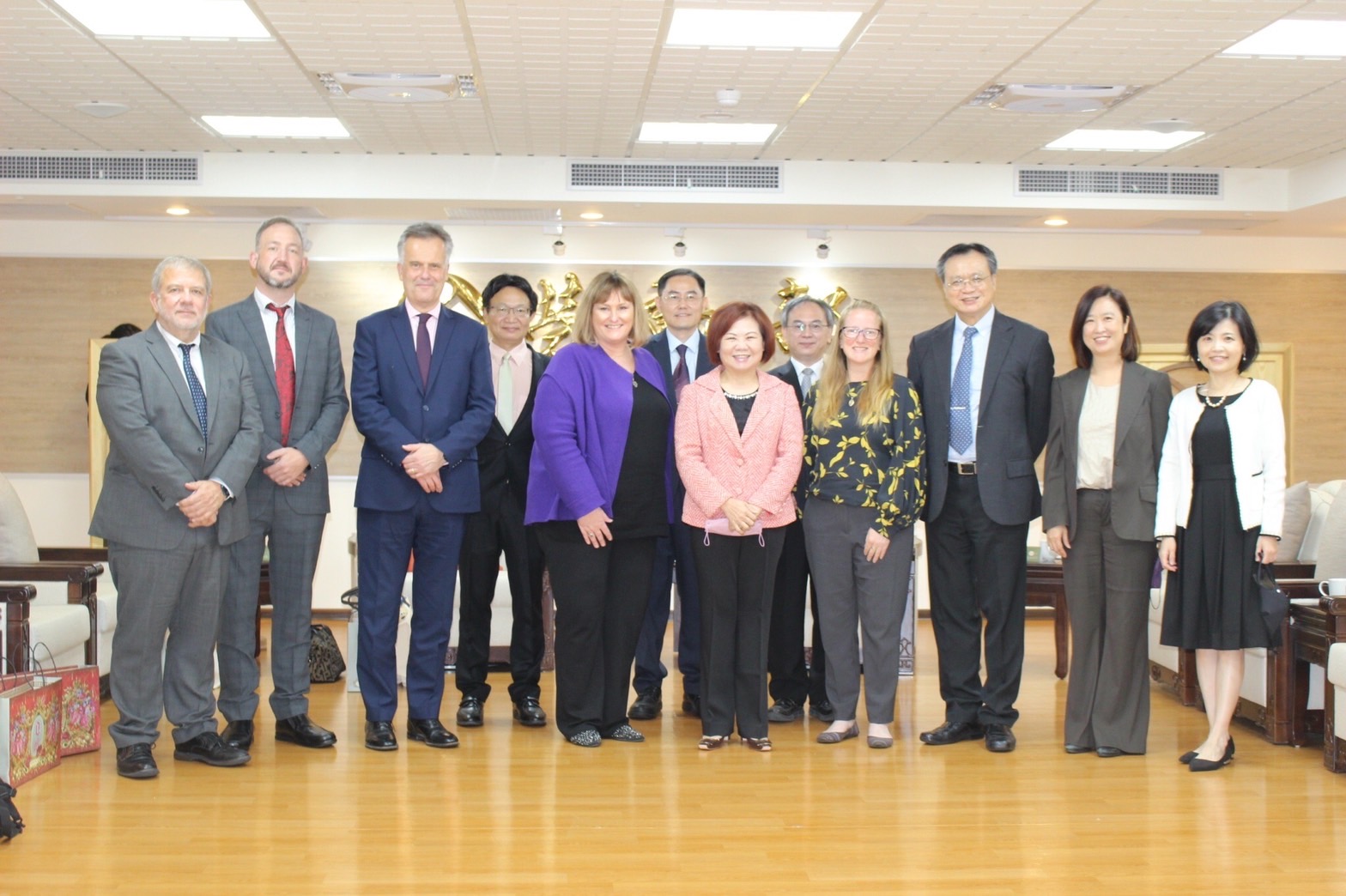 A Group Photo Of The Minister Of Labor With The HSE Delegation And British Office Taipei After The Summit